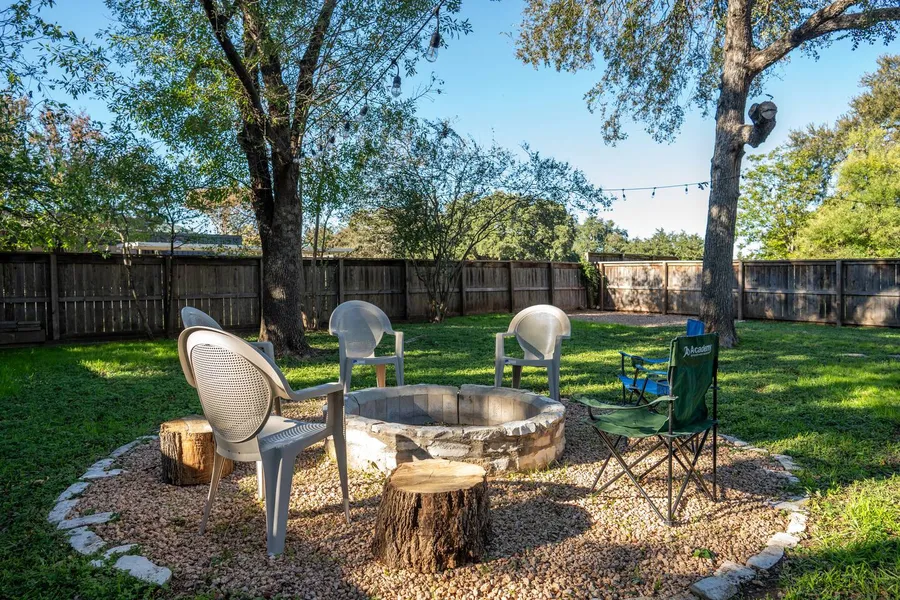 Fire pit circle with seating at UptownBnB in Austin