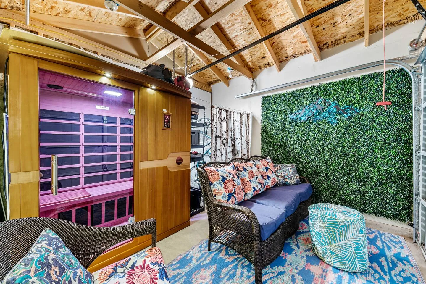 Sauna and lounge with a living green wall at the Birdnest in Englewood